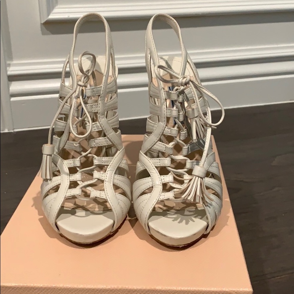 Prada sling back sandal.